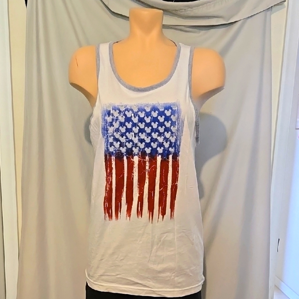 Disney's Y2 K Epcot World showcases patriotic tank top.